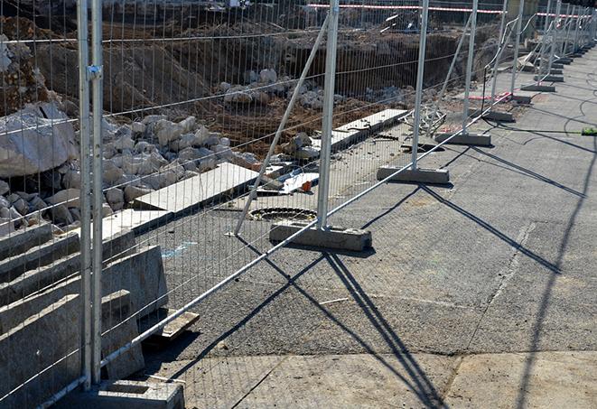 a close-up of a temporary fence panel, showing its sturdy construction